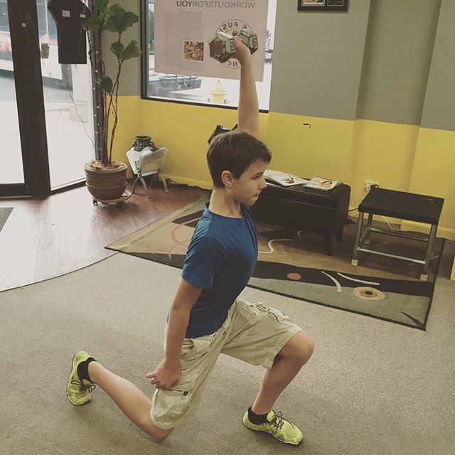 Caleb getting some weighted lunges.  #personaltrainer #gym #denver #colorado #fitness #personaltraining #bodybuilder #bodybuilding #glutes #quads #hamstrings #curls #arms #biceps #abs #core #situps #squats #squat #lunges #legs #legday #weightlifting #weighttraining #men #boy #buff #strong #kids  #teen