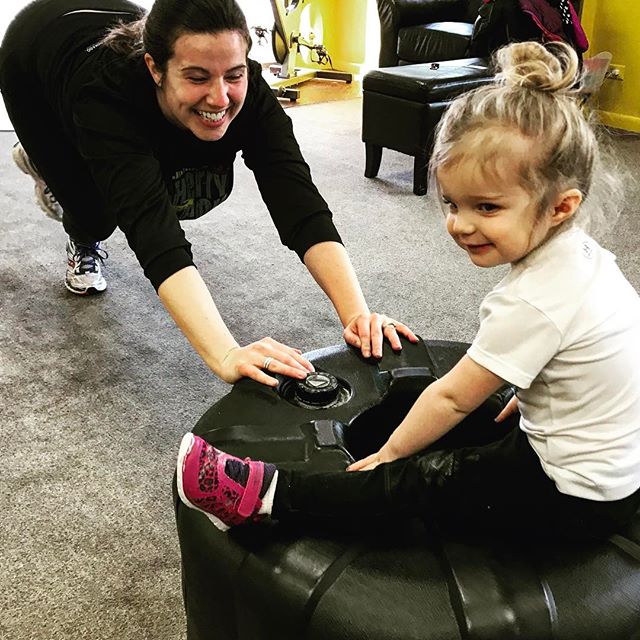 Mallory pushing Emmy on the plate today at group personal training #Denver #Denvermom #mom #baby #babies #kid #kids #children #fitness #gym #workout #colorado #personaltrainer #personaltraining #mother #child #sweat #fun #weights #dumbbells #squats #lean #gainz #fatloss #calories #groupfitness #denvergym #cardio #core