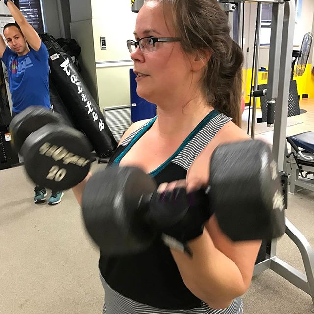 Eileen curling with Rod modeling in the background  #bootcamp #personaltrainer #gym #denver #colorado #fitness #personaltraining #trainerscott #getinshape #fatloss #loseweight #ripped #toned #chestpress #benchpress #chest #bench #chestday #pecs #arms #arm #armday #shredded #fitbabe #triceps #biceps #babe #strong #fitnessmodel