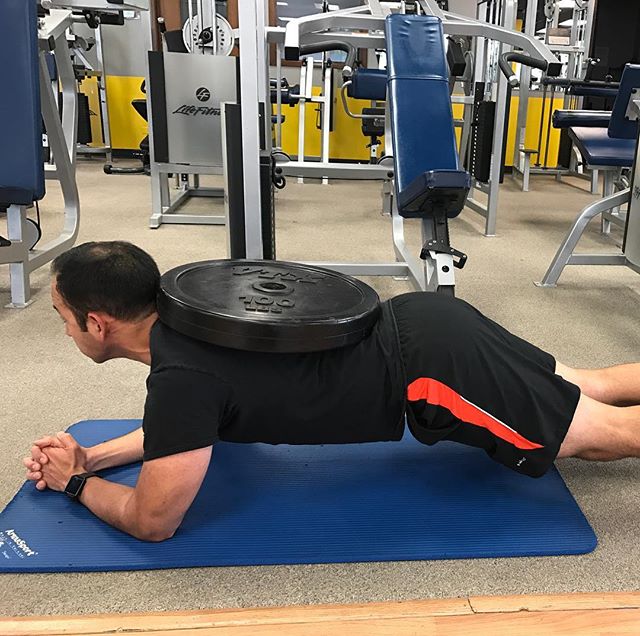 Planking with the 100 plate on your back for a minute?  Uh, easy. #personaltrainer #gym #denver #colorado #fitness #personaltraining #fun #bodybuilder #bodybuilding #deadlifts #life #running #quads #girl #woman #fit #squats #squat #lunges #legs #legday #weightlifting #weighttraining #men #sweat #women #cardio #strong #girls